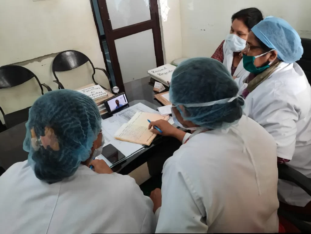 Nurses attend a COVID-19 training session virtually. 