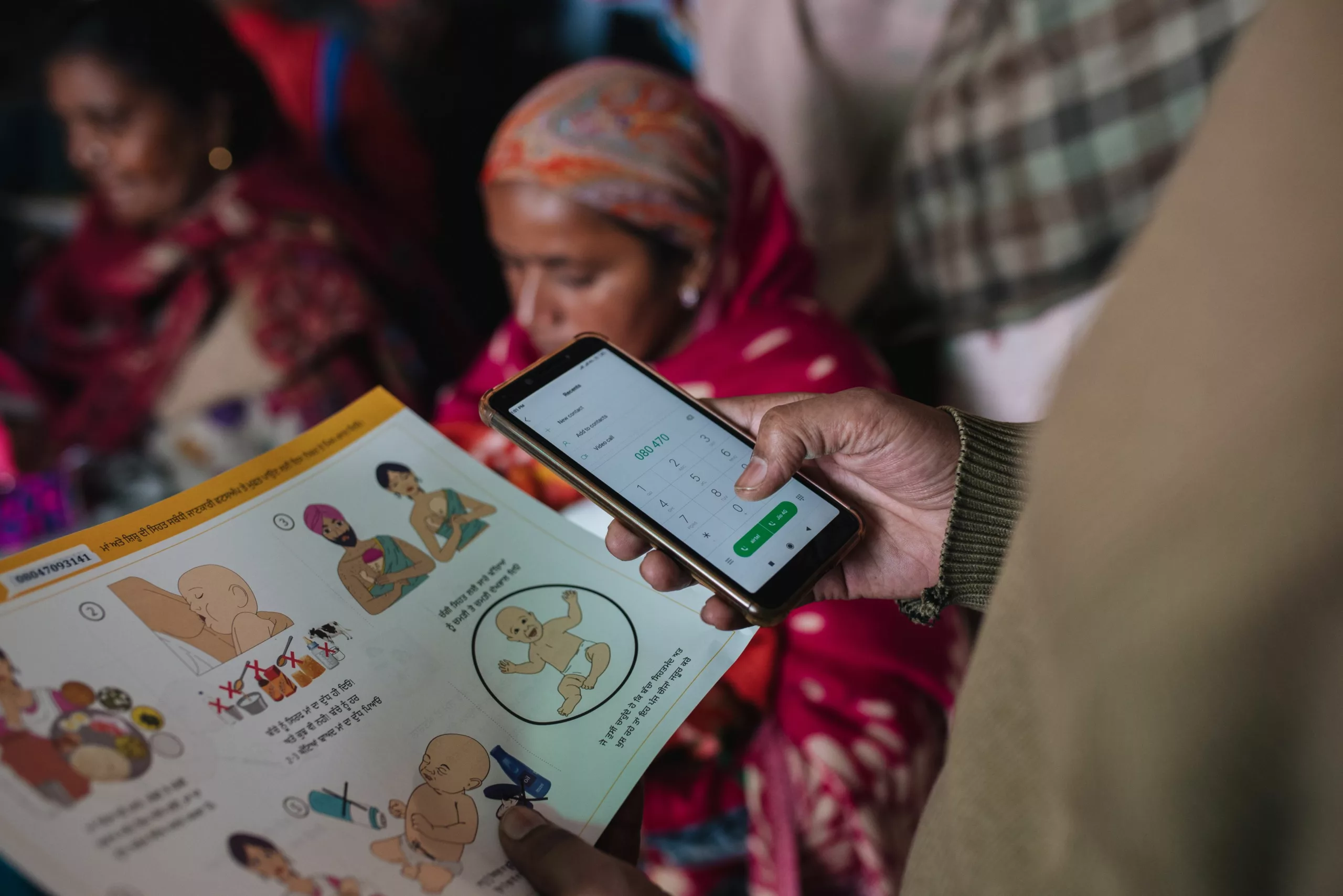 A caregiver signs up to Noora Health's mobile-based health service in Punjab, India.