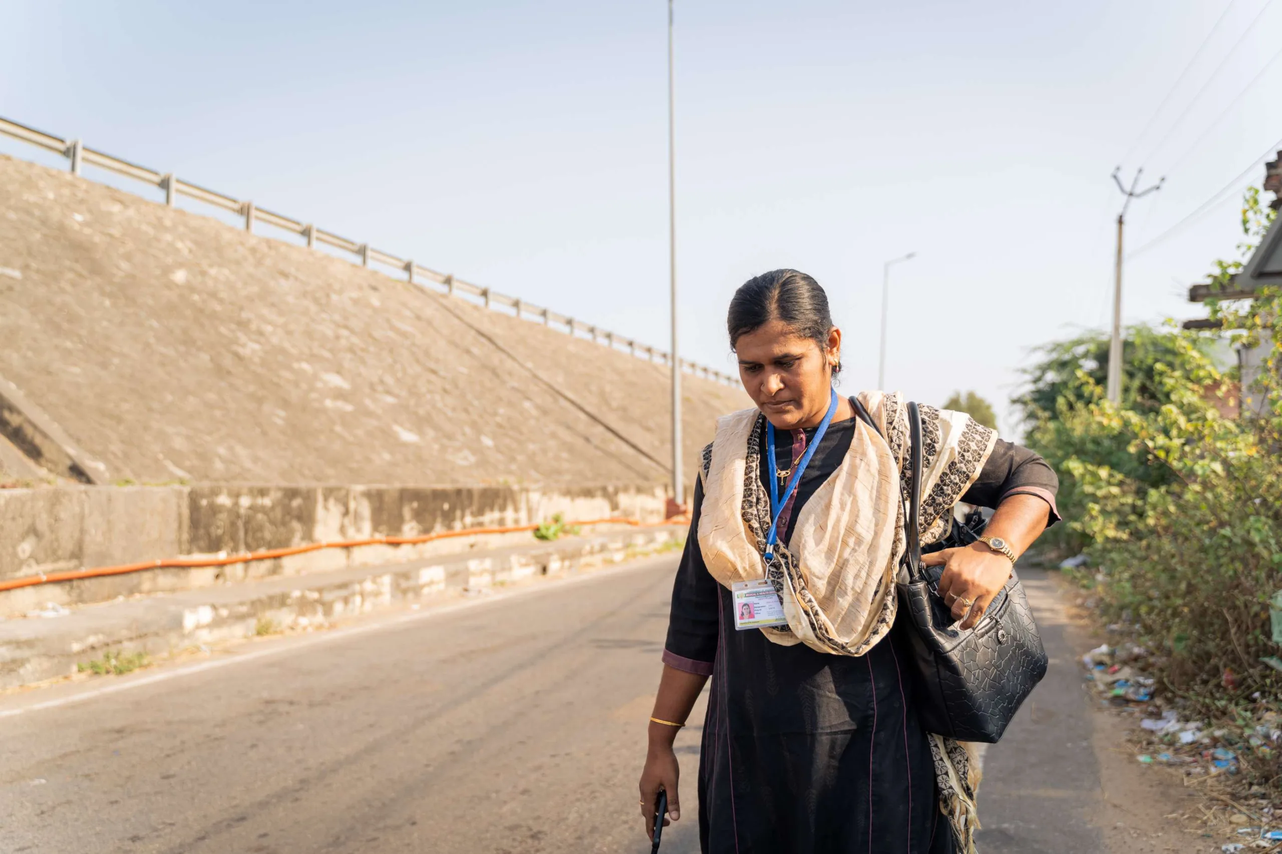 Santhi makes her way to the health and wellness center — ID around her neck, bag in hand, purpose in stride.